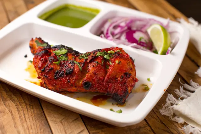 Bawarchi Biryanis signature dishes Bawarchi Tandoori Mix GrillGobi ManchurianHyderabad Chicken Curry